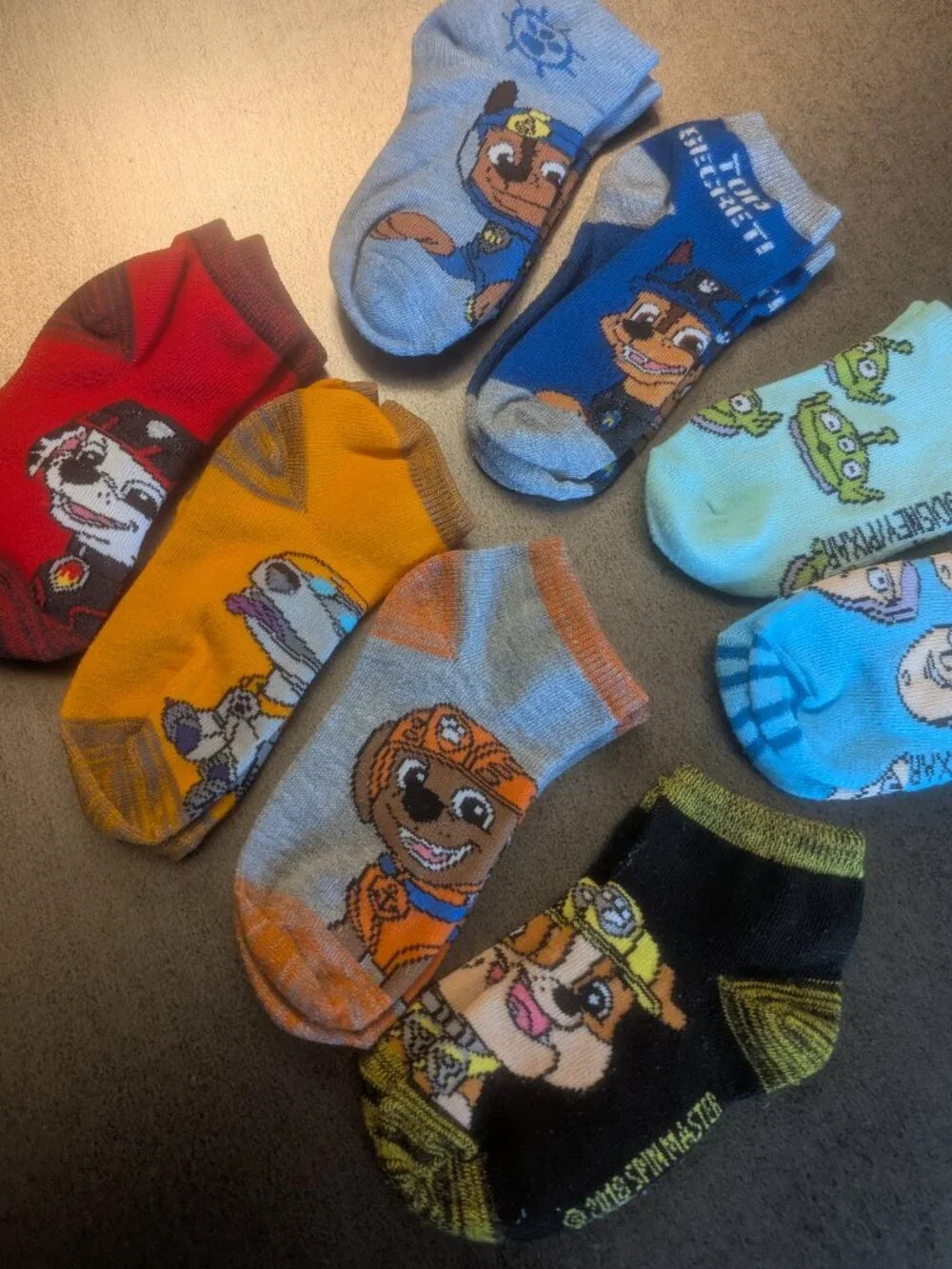 3/$10 - Bundle of 8 Paw Patrol + Toy Story Ankle Socks - M